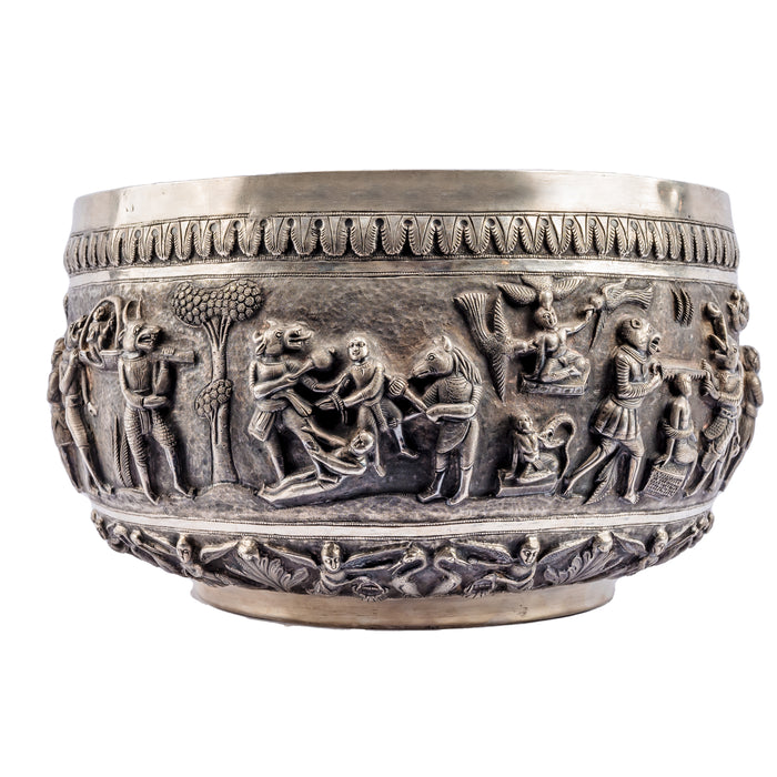 A large 19th-century Indian silver bowl ornamented using repousse, chasing and engraving depicting scenes of Naraka (Hell)