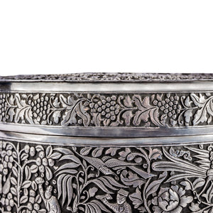 Antique Chinese Straits silver repousse cylindrical lidded box, mid-nineteenth century