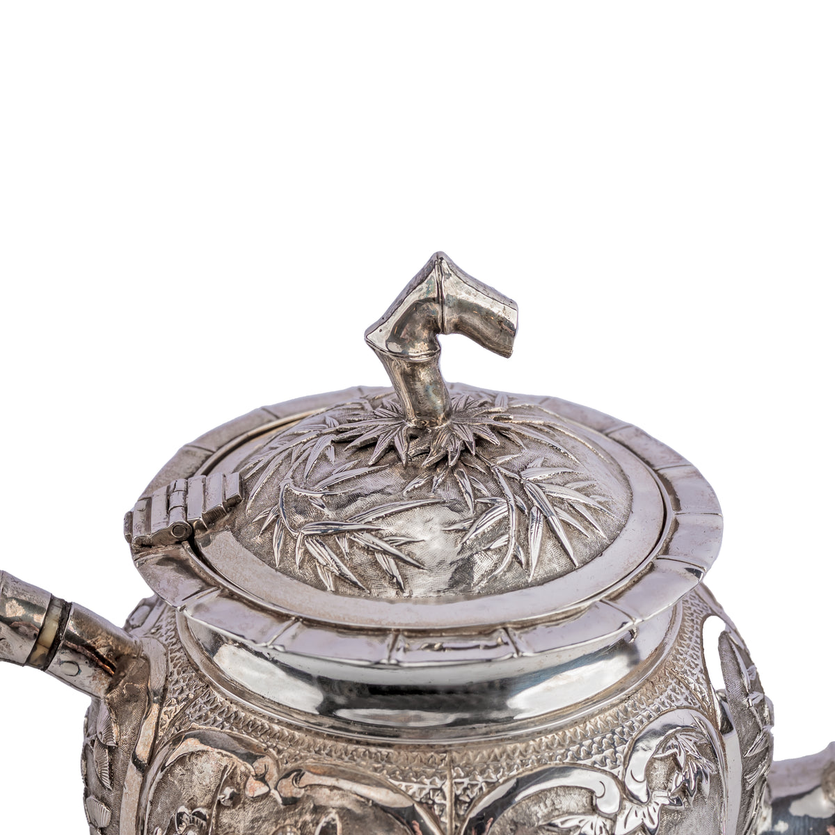 Antique Chinese Silver Teapot with decorative repousse panels and bamb Joseph Cohen Antiques